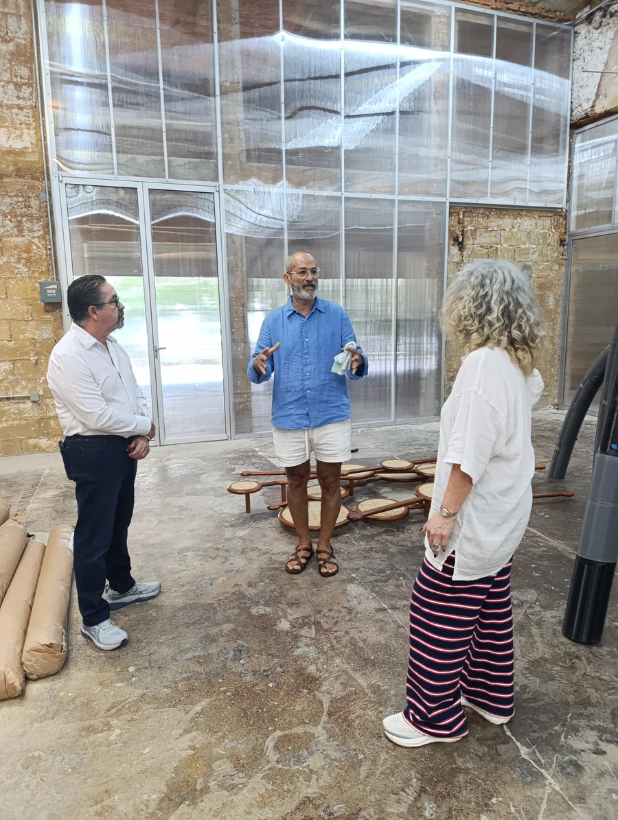 Marcos Castillo converses with visitors in his Mérida studio