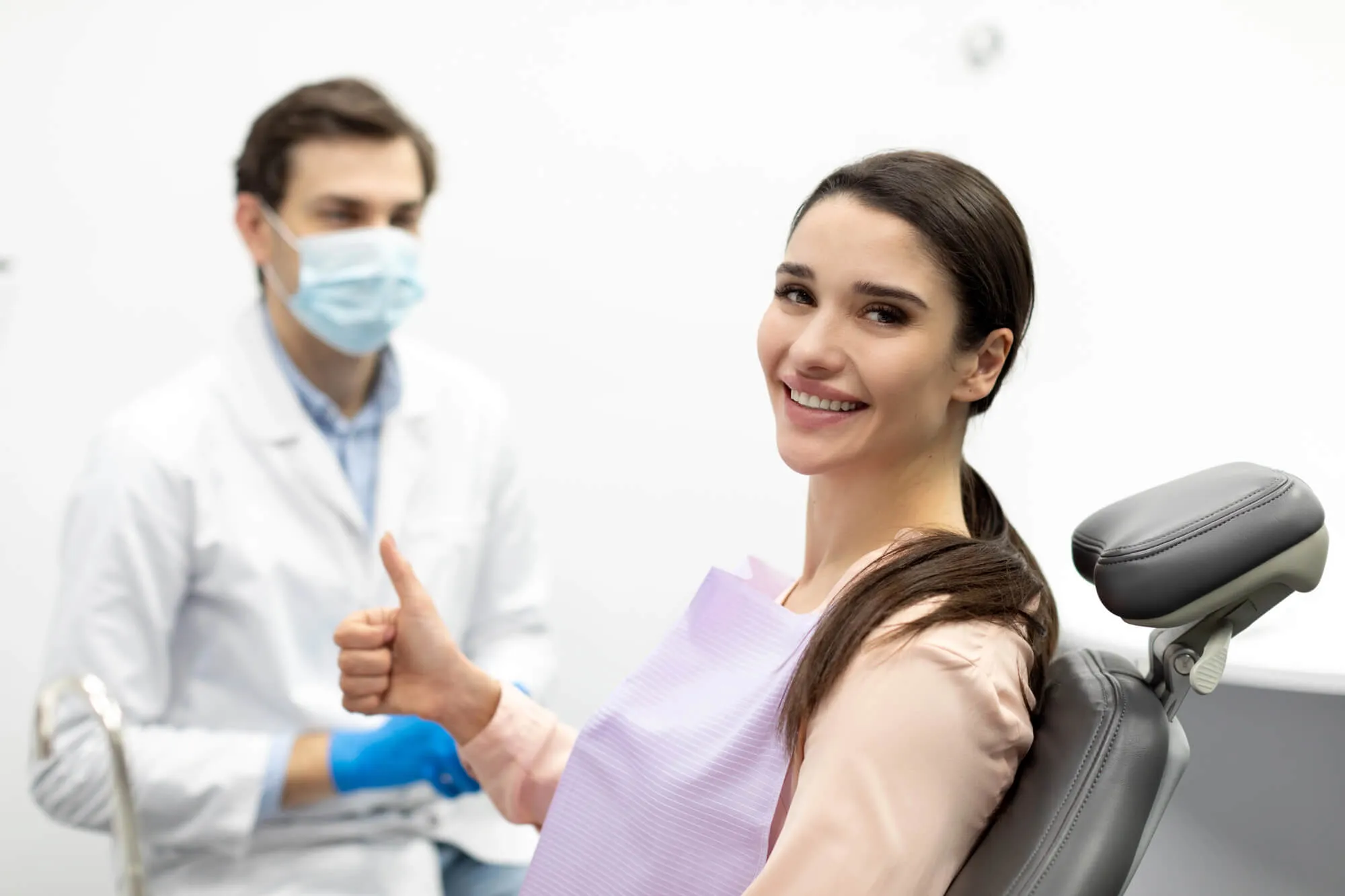 dentist discussing dental crown lengthening nashville