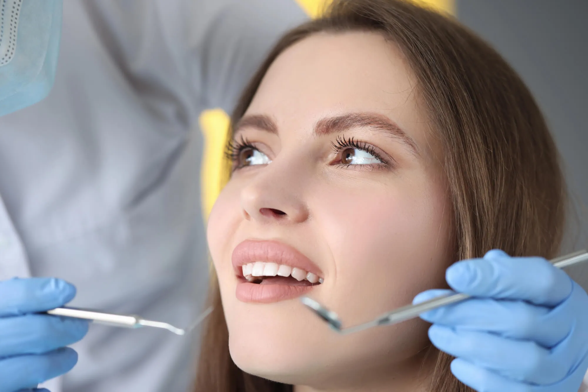 patient getting hybrid denture