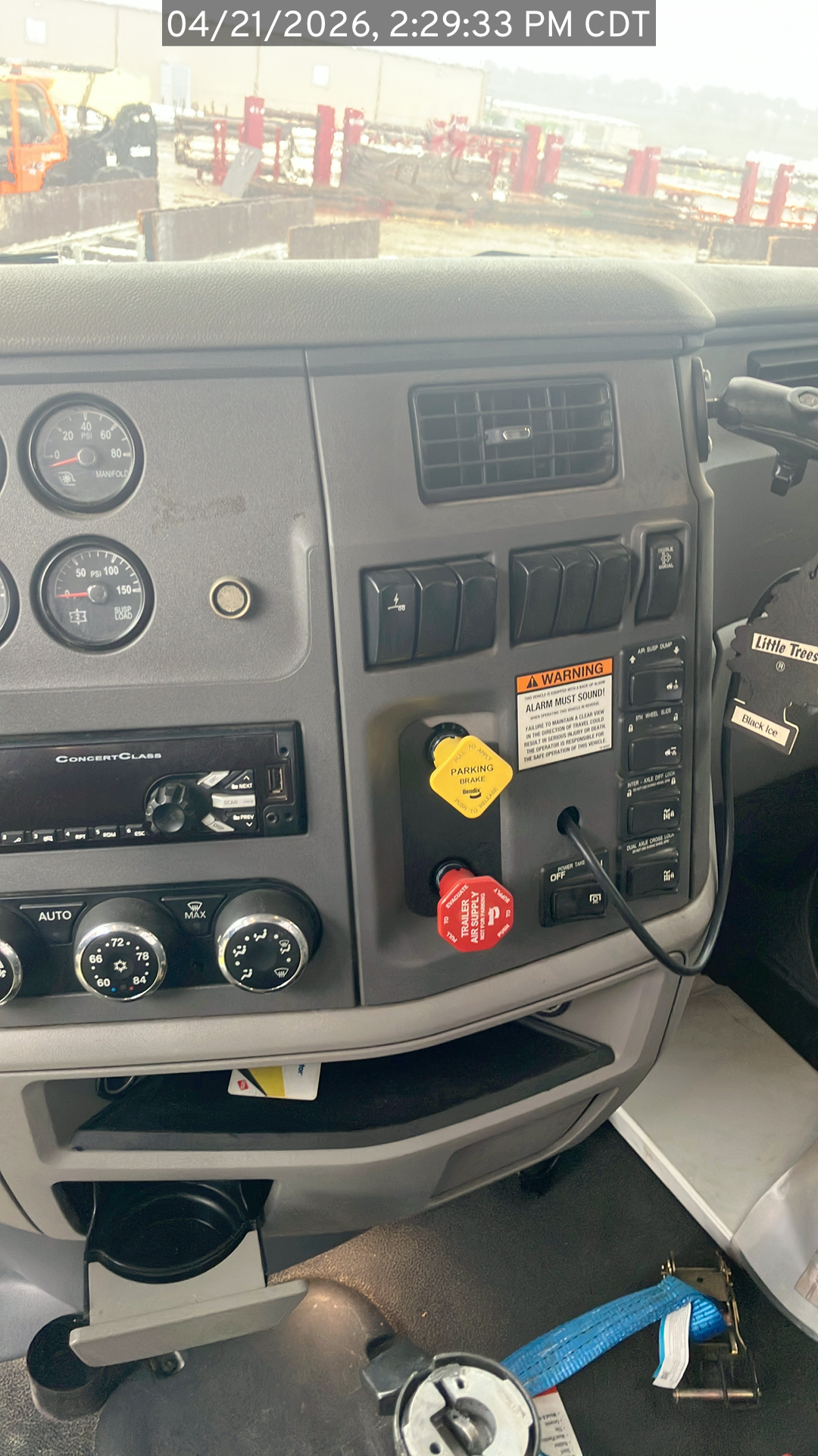 Photo: Dashboard of the Peterbilt 579 listed for sale. Focus on central panel.