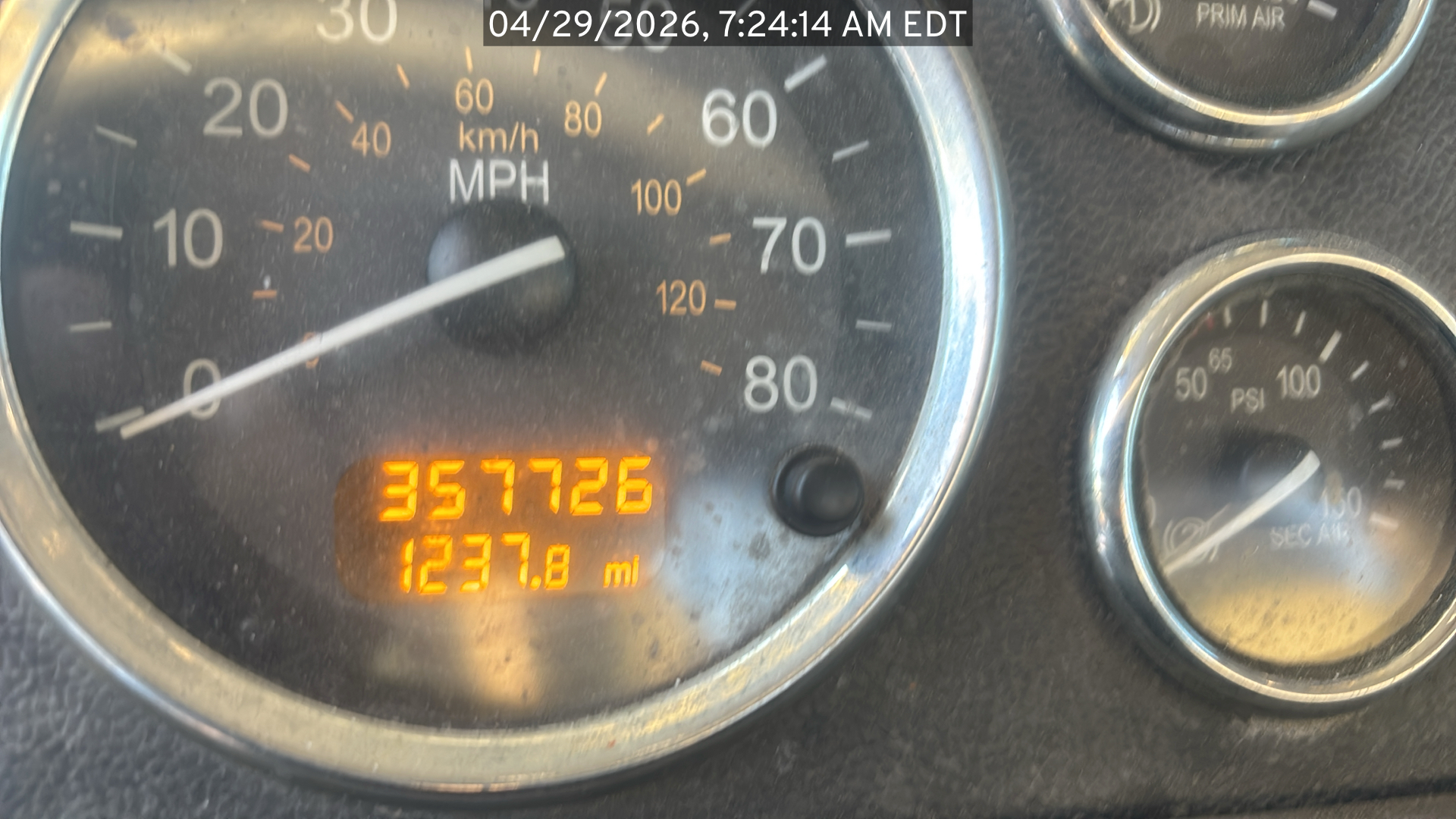 Photo: timestamped photo of the odometer reading on the Peterbilt 384 offered for sale. Shows milage of 357,726 and timestamp of April 29, 2026, 7:24:14 am EDT