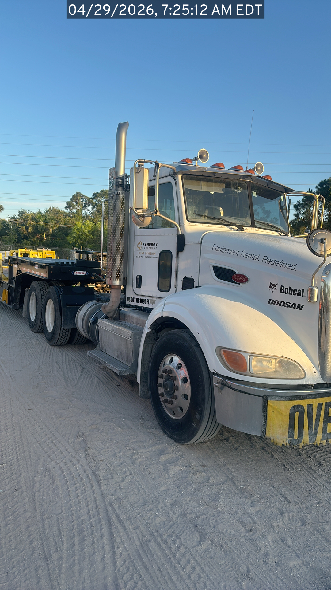Photo of the Peterbilt 384 listed for sale, view from the front passenger side of the vehicle