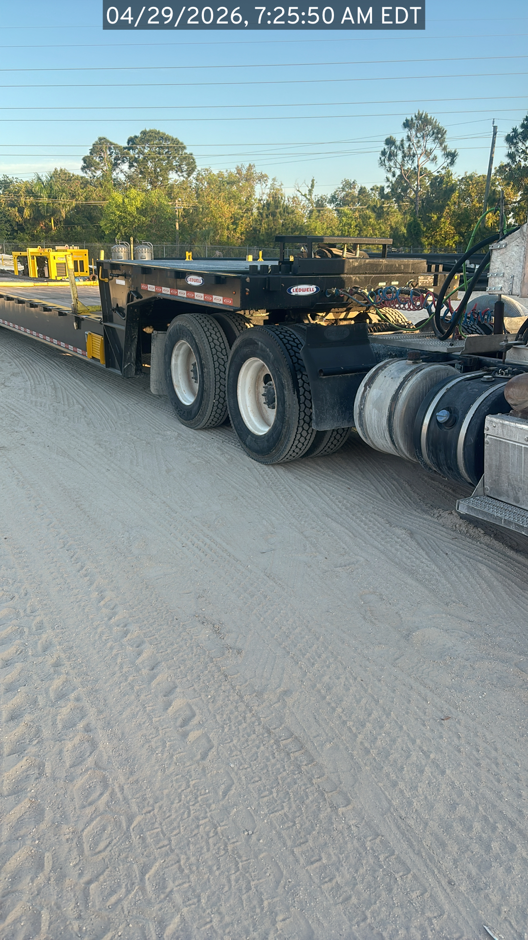 Photo of the Peterbilt 384 listed for sale, view from the passenger side of the vehicle with a focus on the trailer hitch.