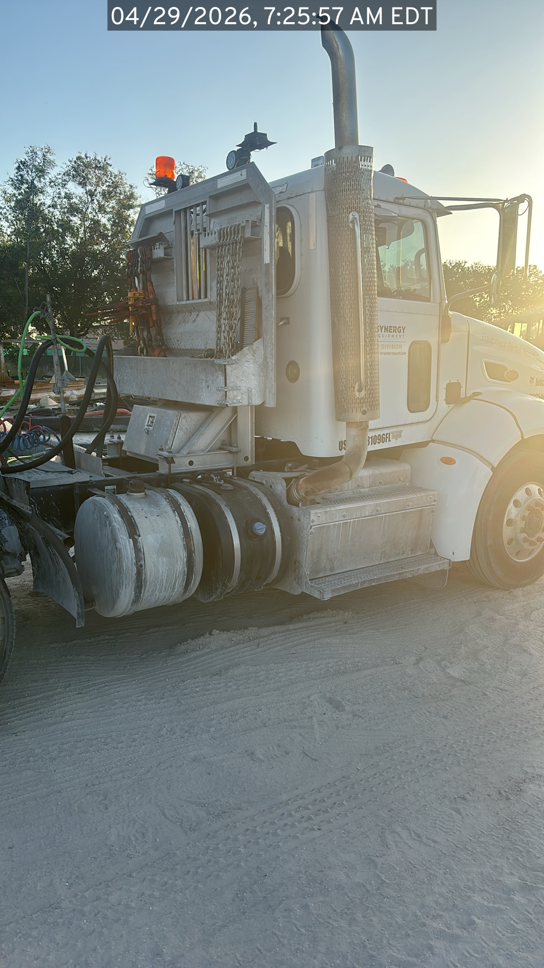 Photo of the Peterbilt 384 listed for sale, view from the front passenger side of the vehicle, focus on the cab