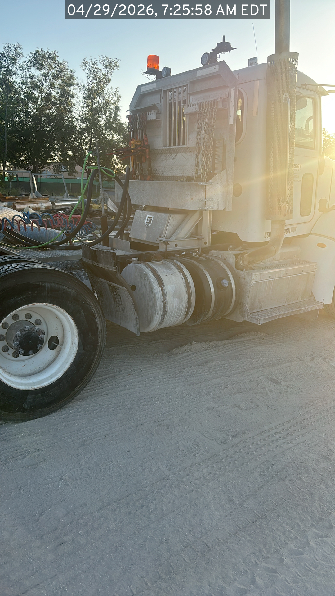 Photo of the Peterbilt 384 listed for sale, view from the front passenger side of the vehicle, focus on the cab