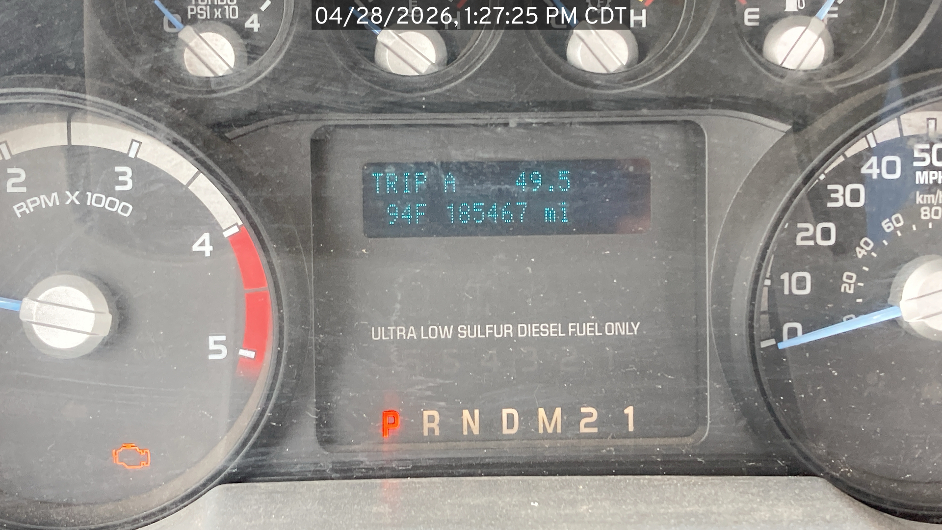 Image of the Ford F250 listed for sale, timestamped photo of the odometer reading. Odometer shows reading of 185,467 miles and the timestamp is April 28, 2026, 1:27:25 PM CDT