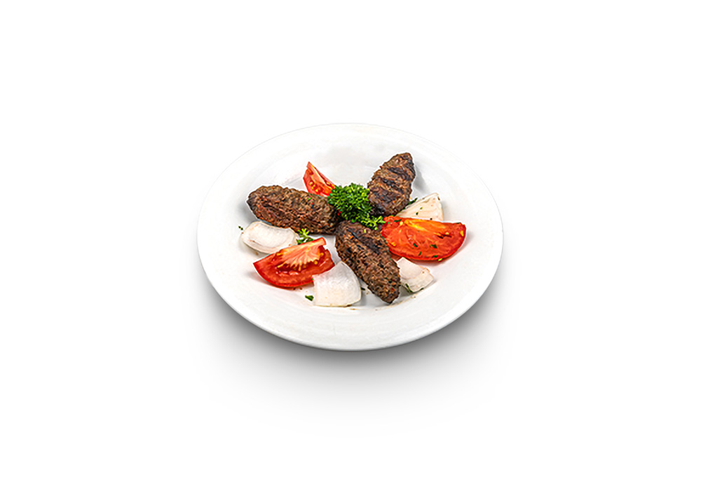 Grilled ground beef and lamb skewers seasoned with parsley