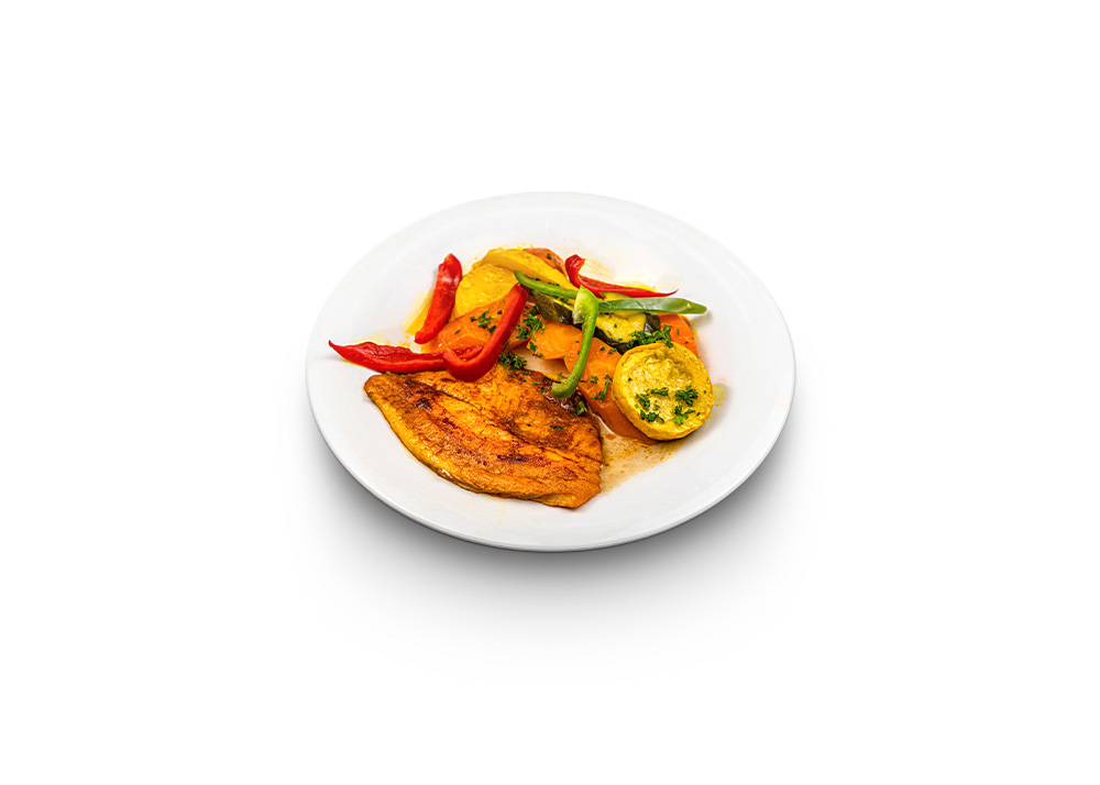 White fish fillet baked with lemon slices and herbs