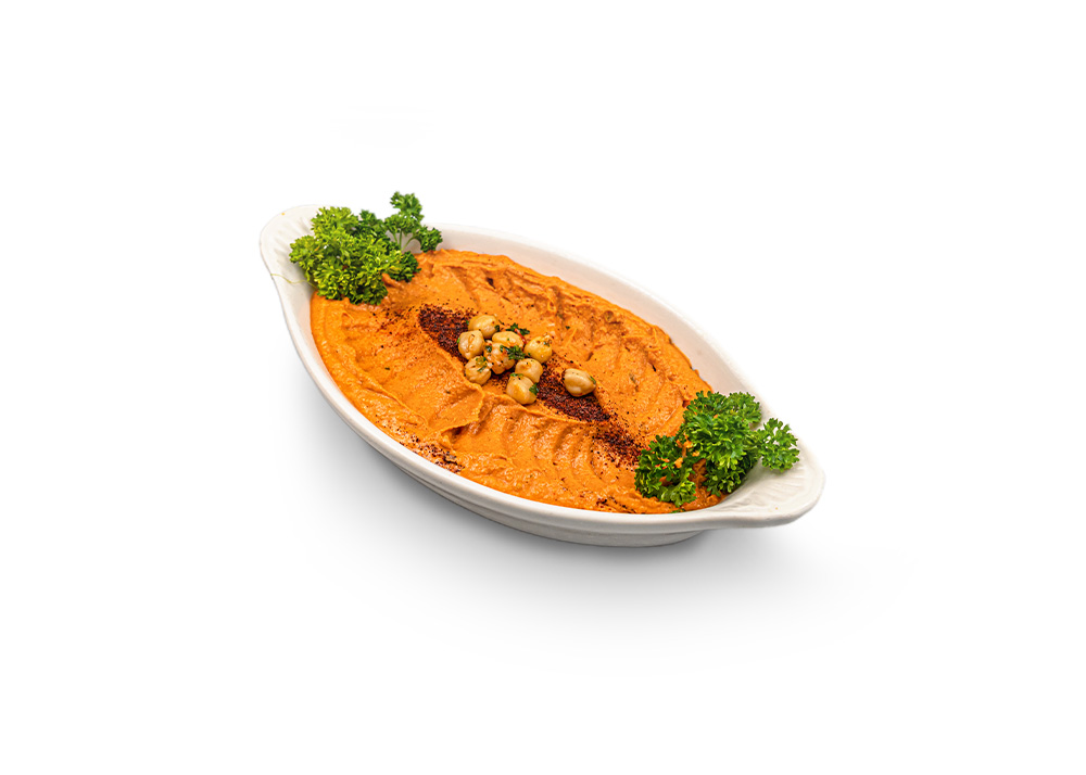 Red-tinted hummus blended with spicy peppers