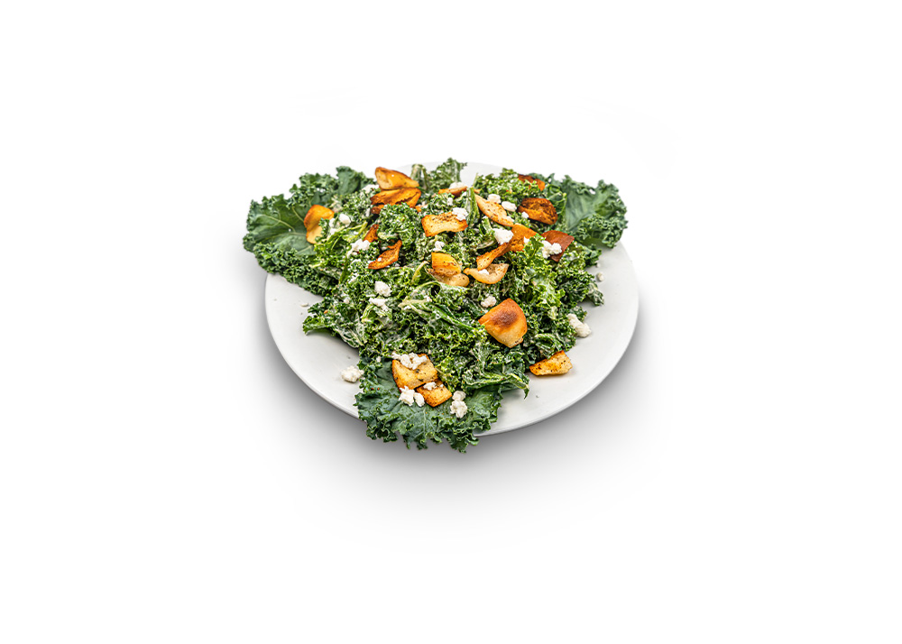 Fresh kale leaves tossed with parmesan and croutons