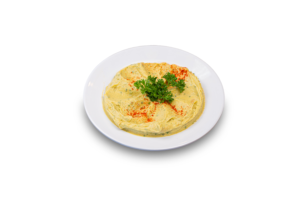 Creamy green avocado-blended hummus topped with olive oil and spices