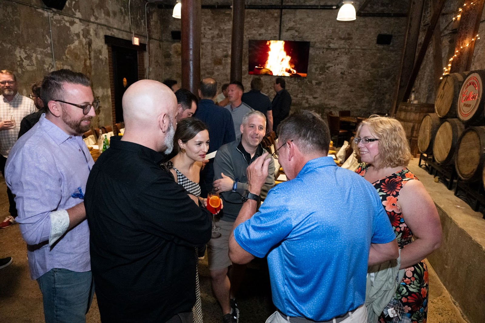 Hosts and attendees gathered for casual chat the TeeCommerce dinner