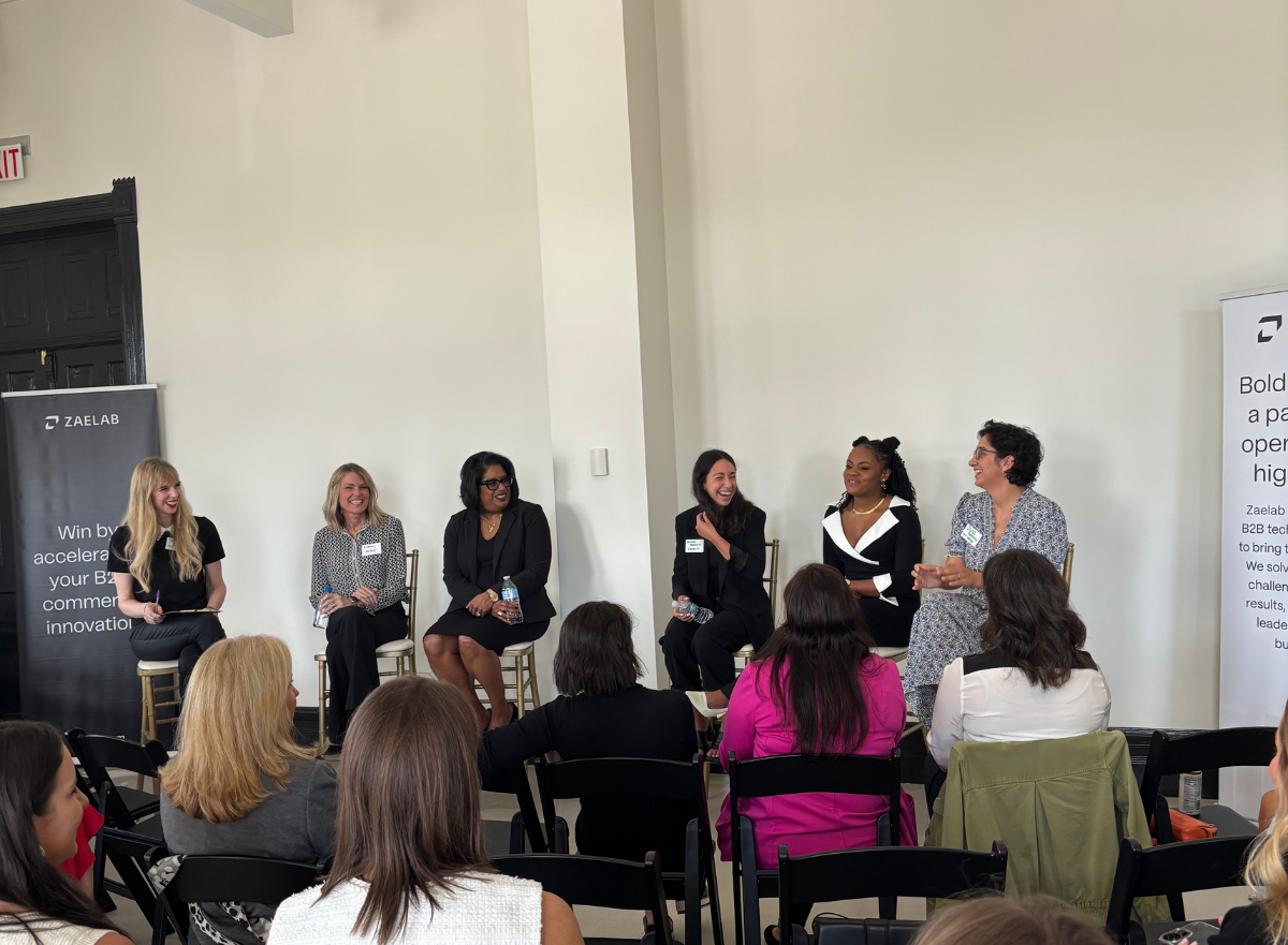 A panel of six women leaders share insights on stage at the Women in B2B Thought Leadership Collective.