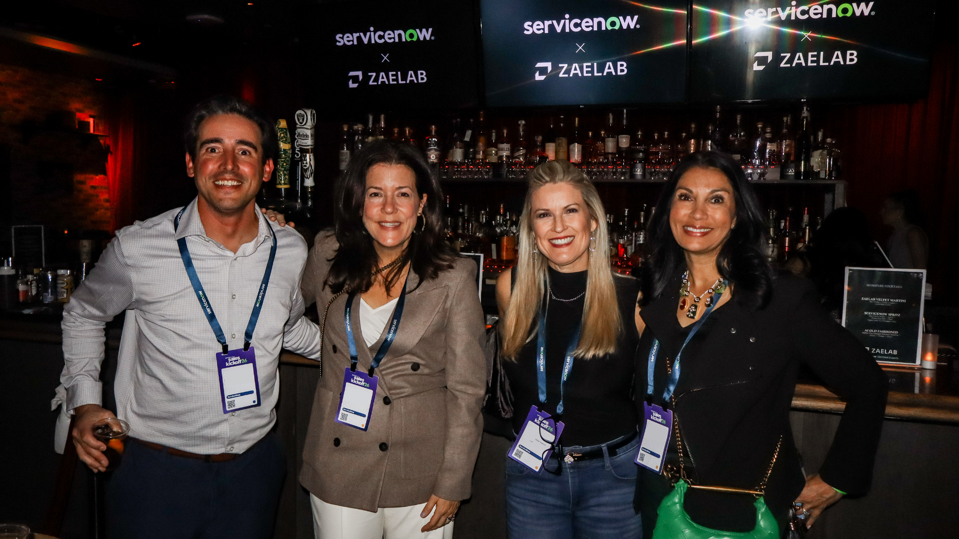 Four attendees at the ServiceNow SKO: After Dark event hosted by Zaelab
