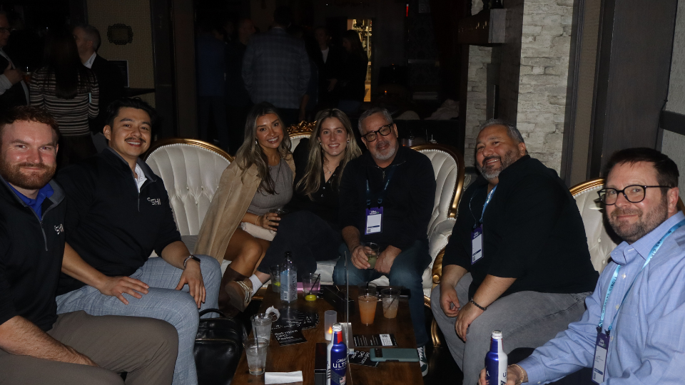 Attendees sitting in the lounge area at the ServiceNow SKO: After Dark event hosted by Zaelab