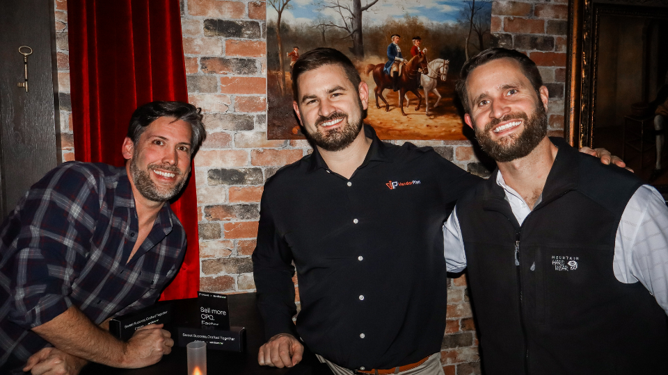 Three attendees at the ServiceNow SKO: After Dark event hosted by Zaelab