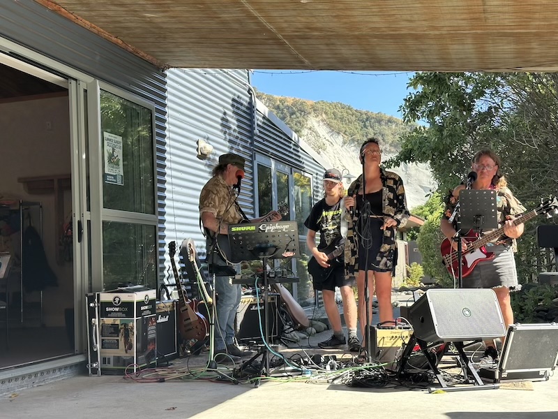 a four piece band playing under the papa cliffs in mangaweka