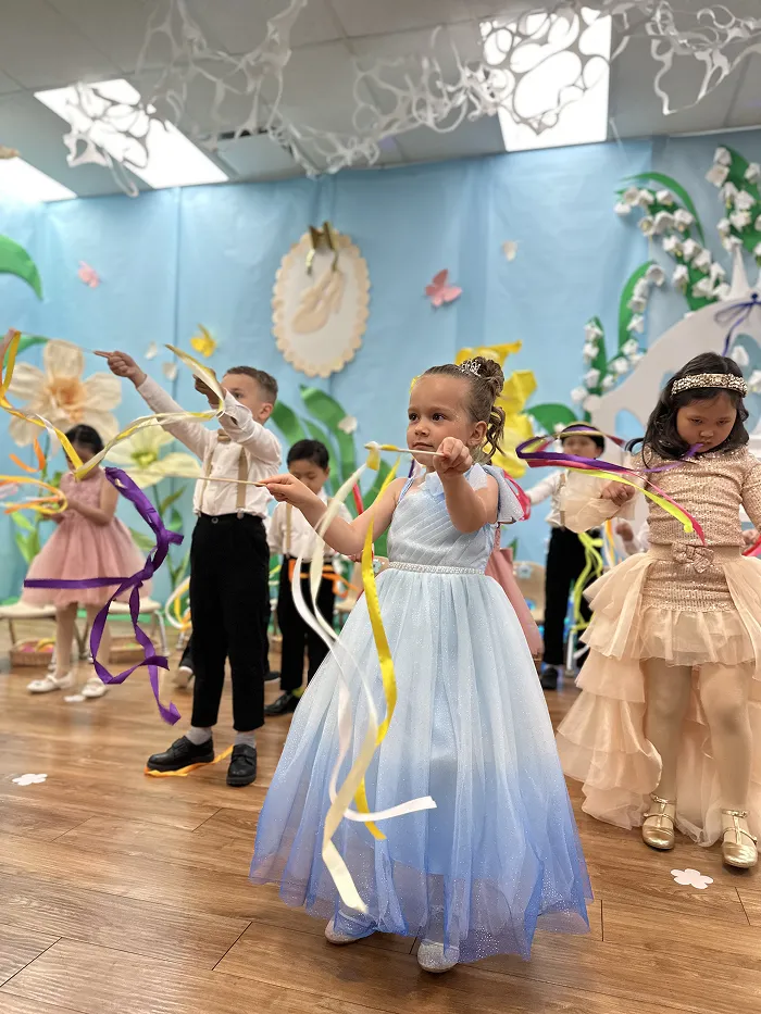 Children dressed as princesses and characters during Children’s Land preschool Broadway performance.