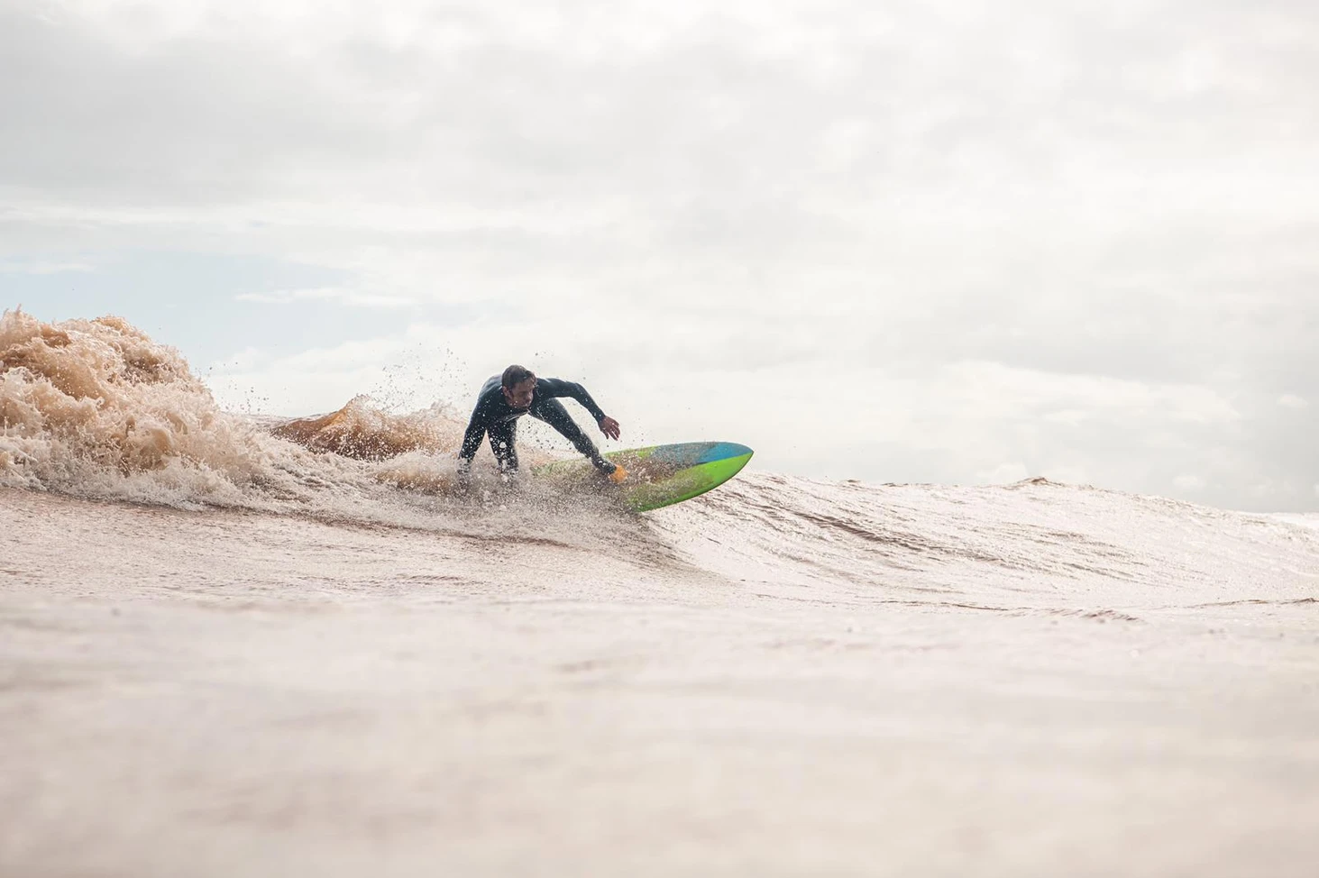 Professional photograph of a surfer