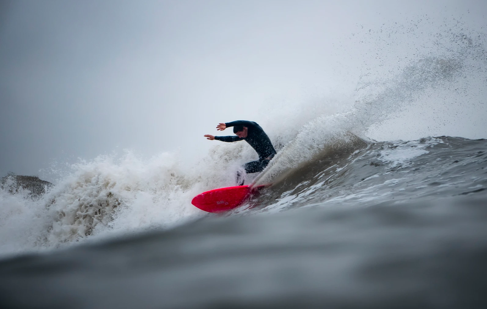 Professional photograph of a surfer