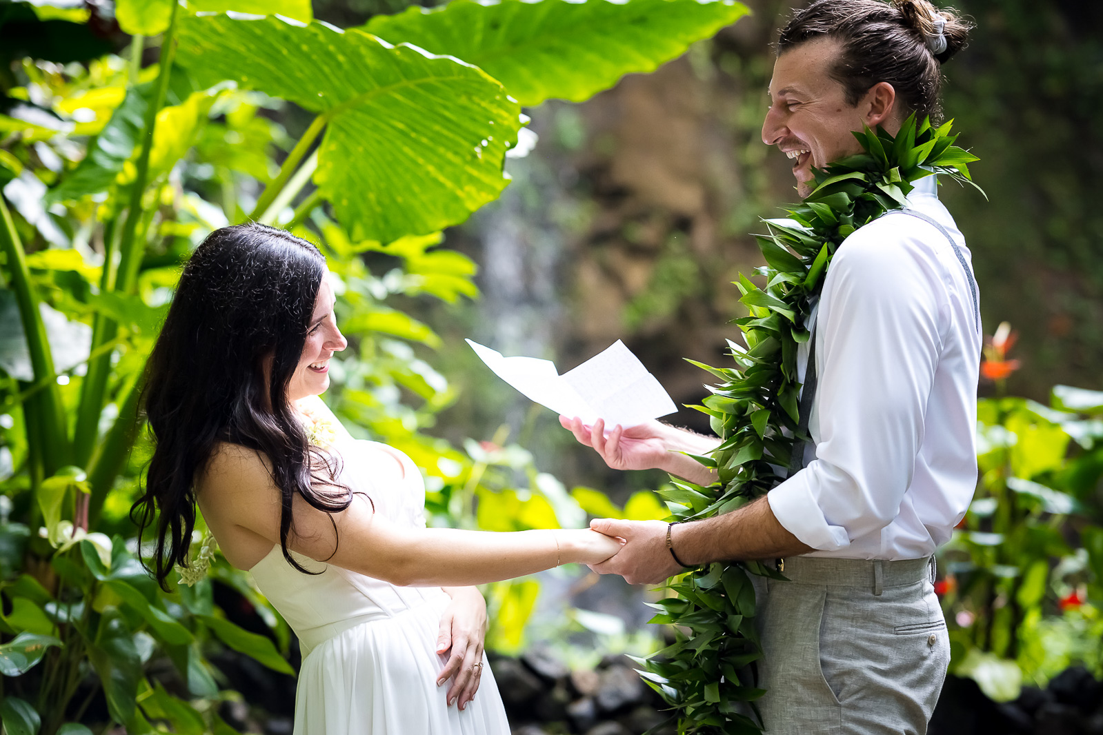 Groom making the bride smile during the vows 