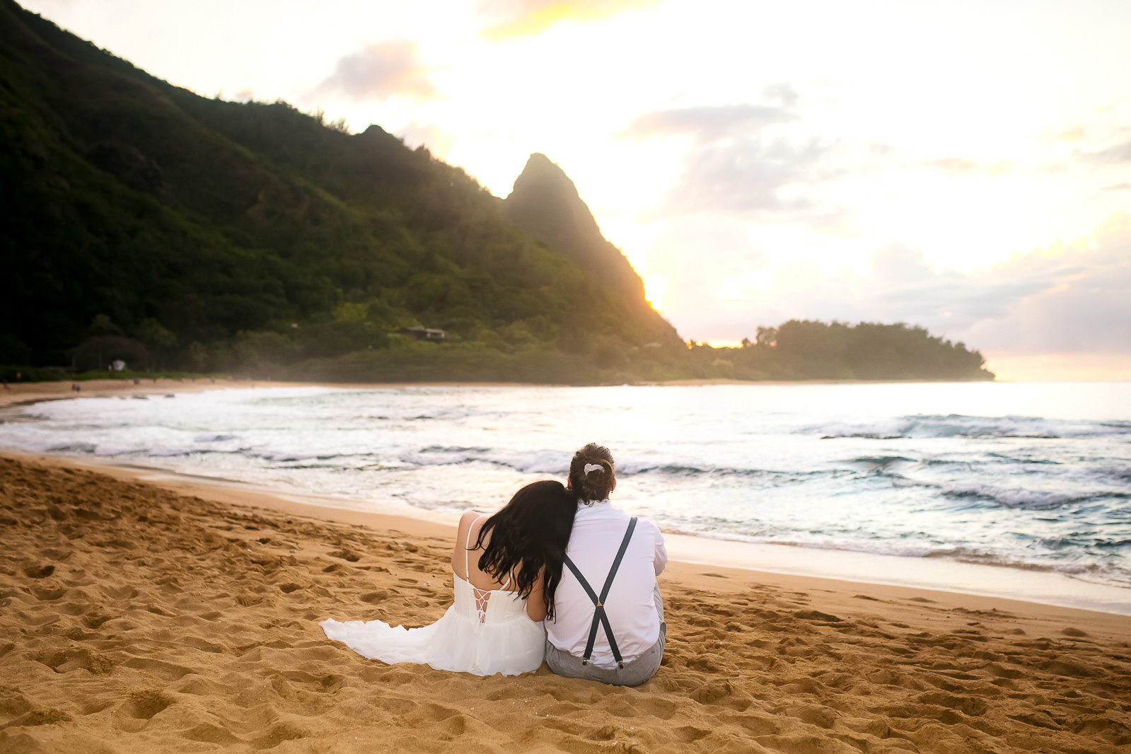 Bride and groom enjoying the sunset together.