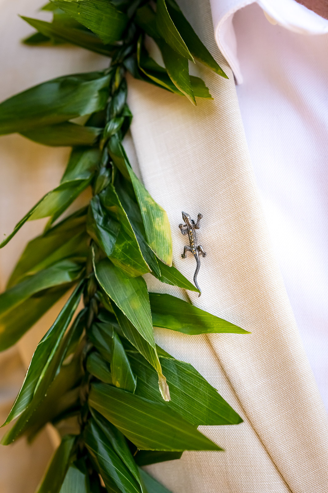 groom wears lei 