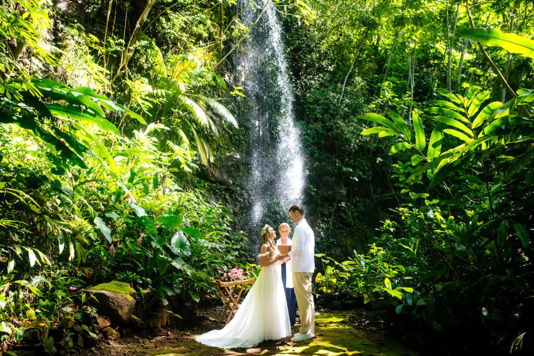 wedding officiant waterfall on kauai