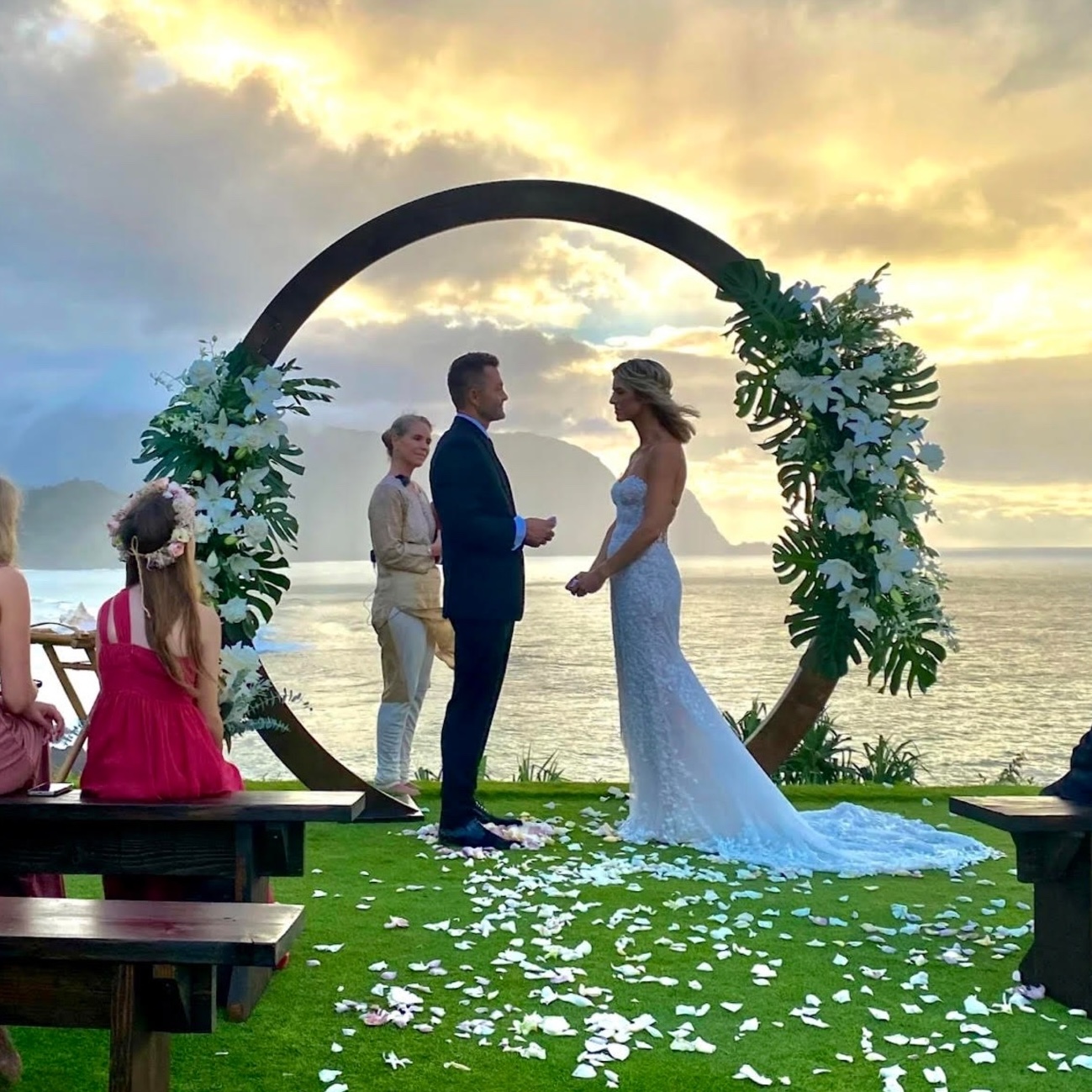 flower arch sunset ceremony