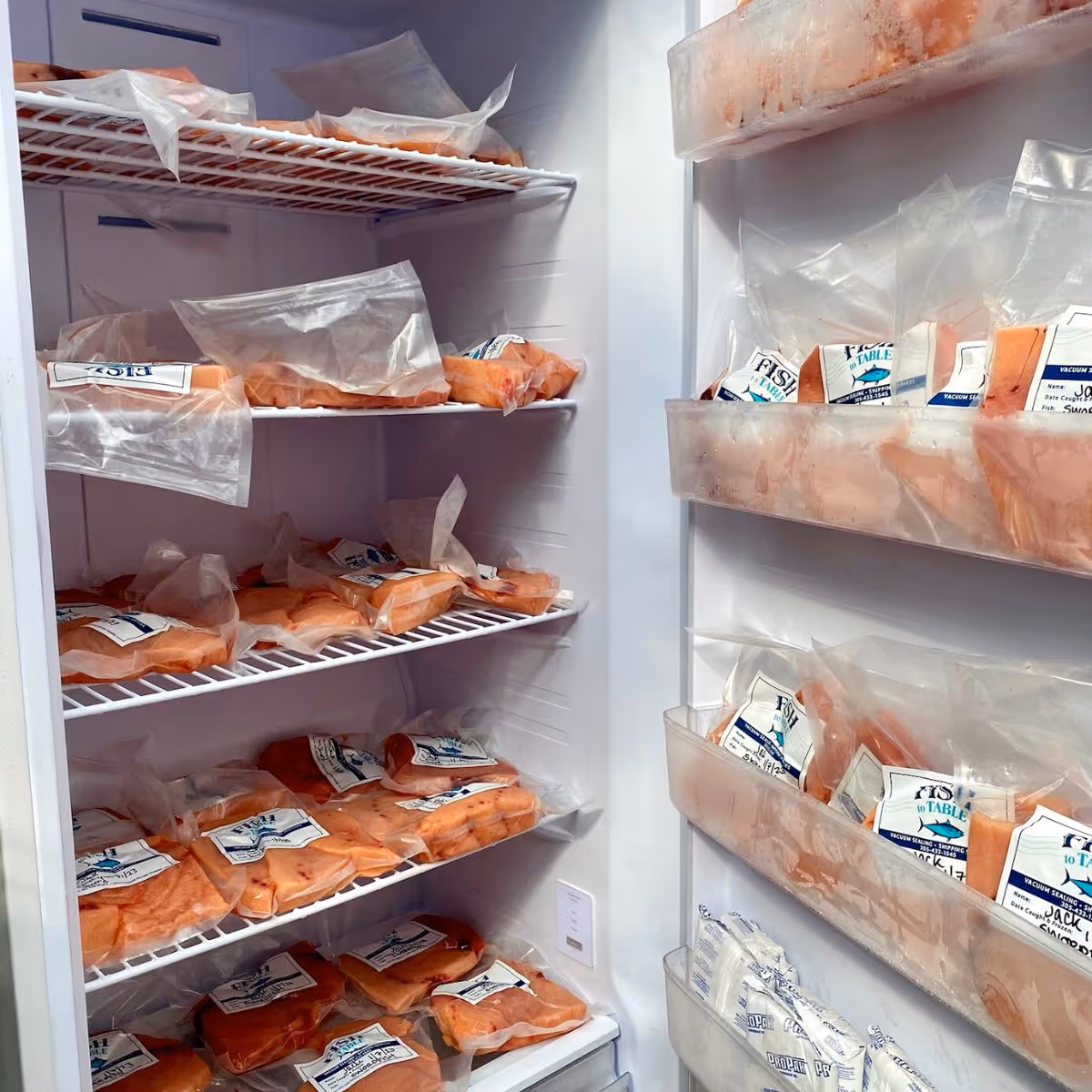 A freezer full of packaged fish.