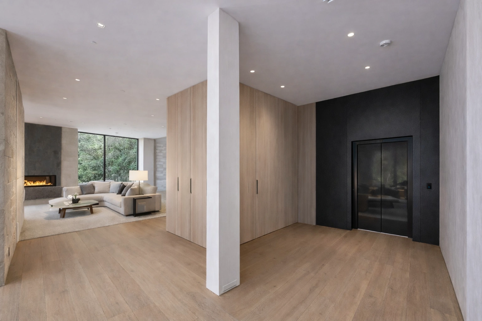 Bespoke home elevator finished in Bronze stainless steel serving the bar area of a high-end residence