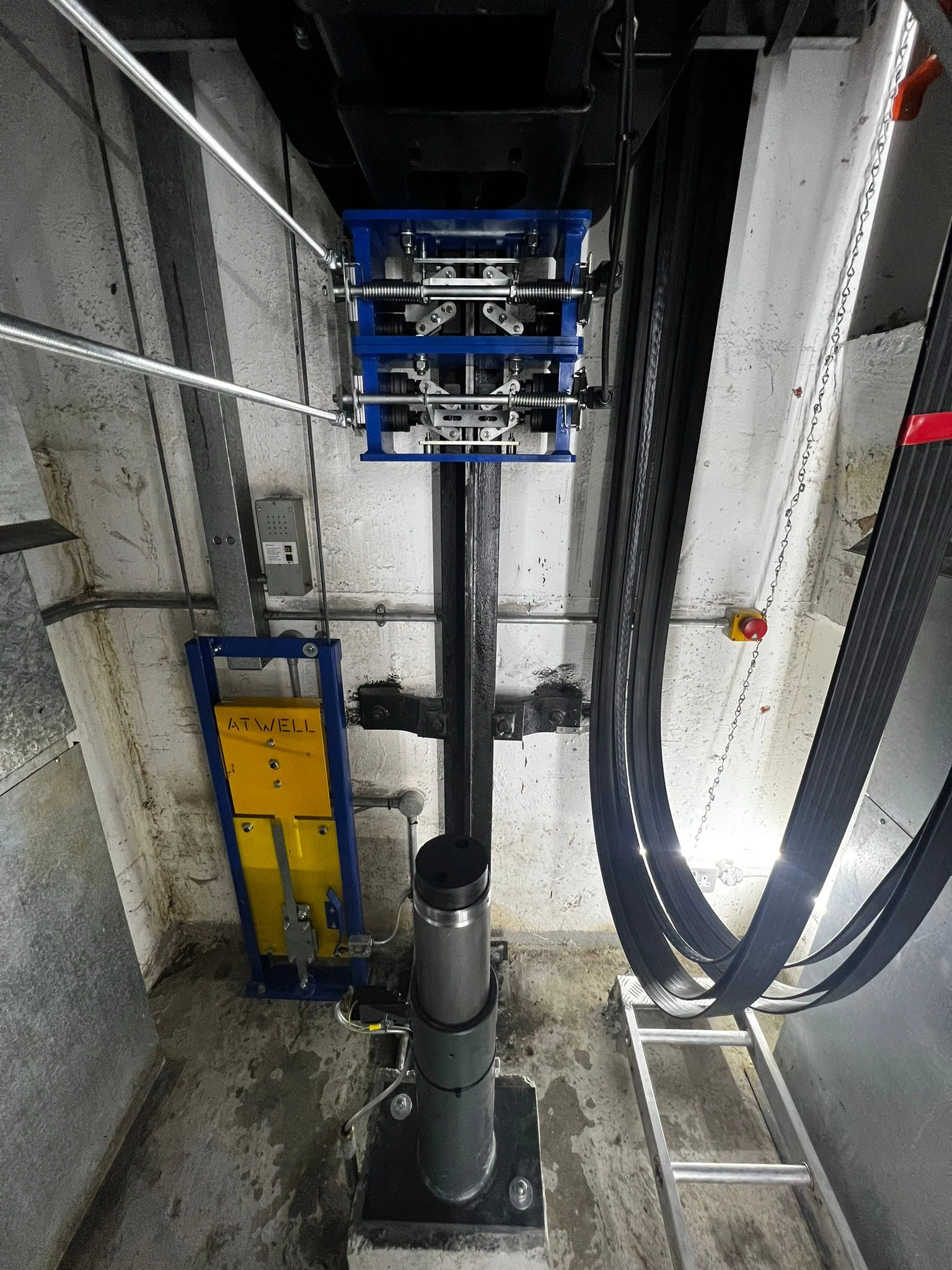 Emergency lift repair engineer working on lift system fault 