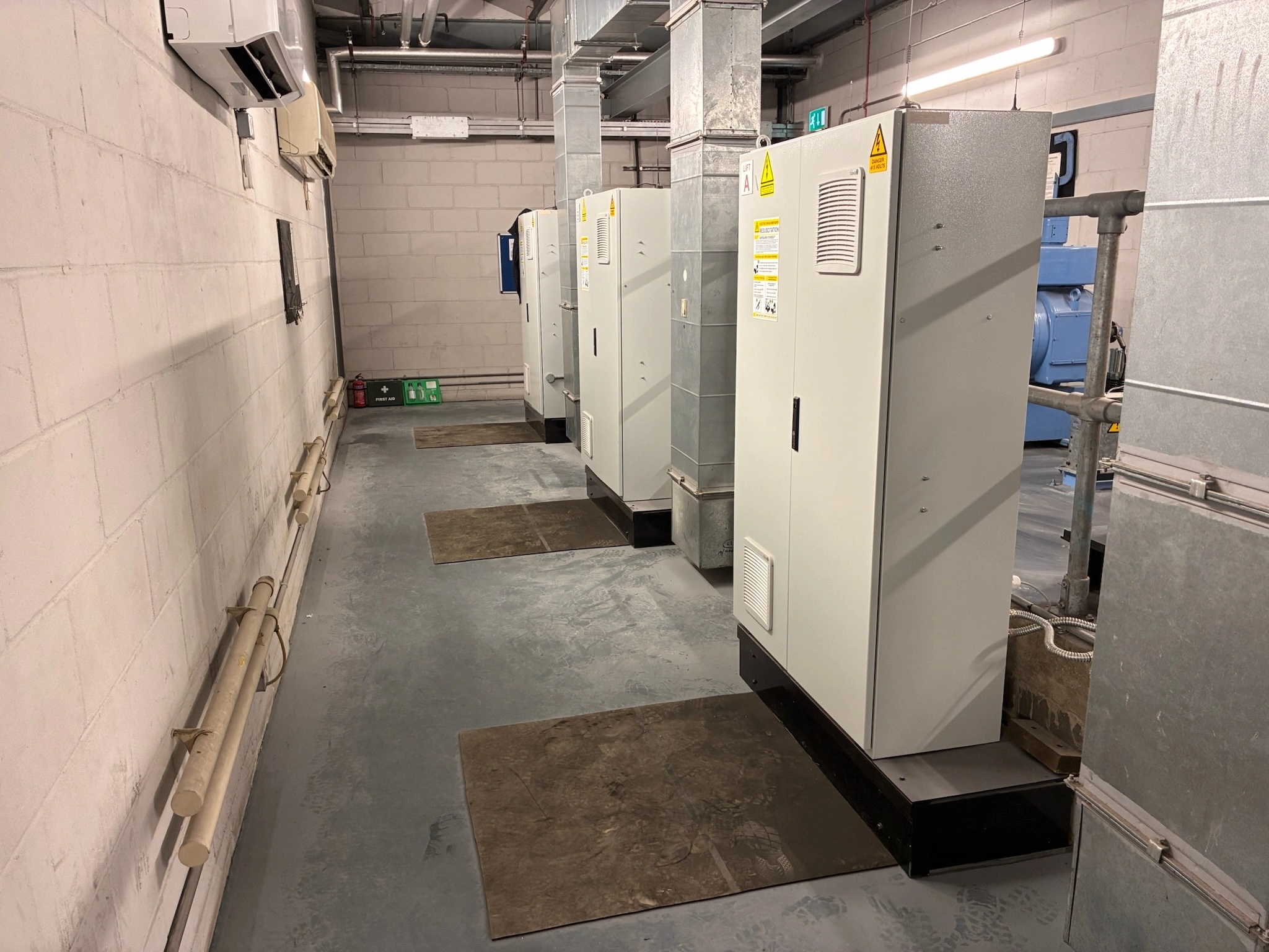 Completed triplex passenger lift installation within the refurbished KPMG Watford office building.