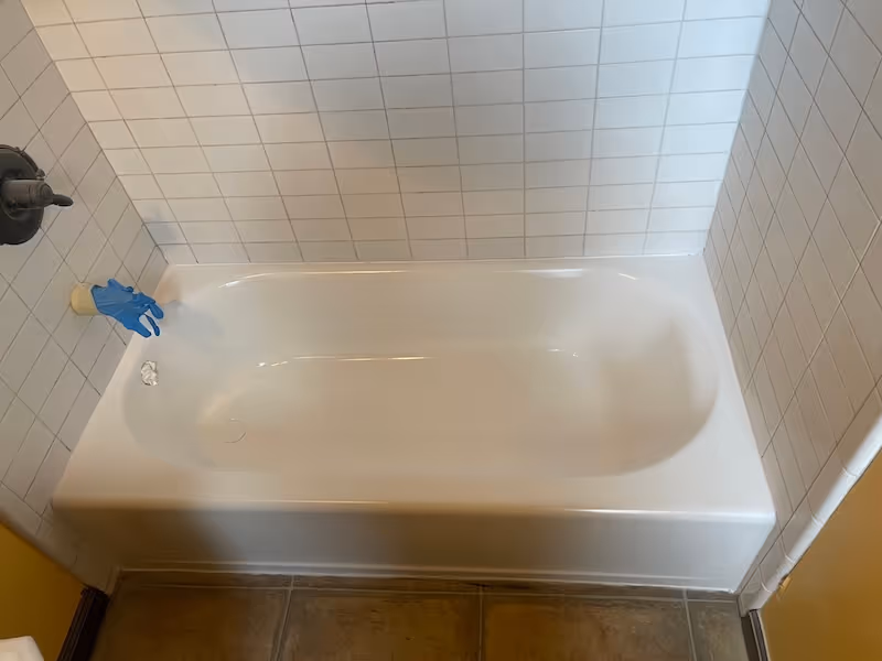 Refinished bathtub with clean white glaze coating — Seattle reglazing service