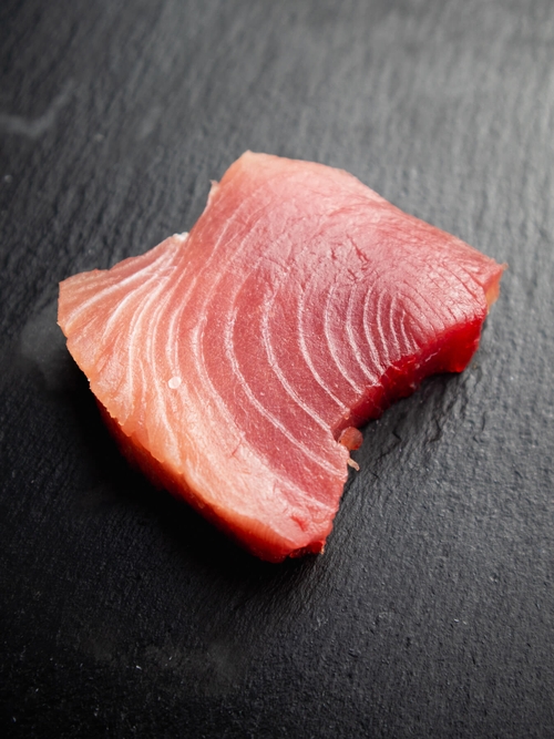 Bluefin Tuna steak on black marble