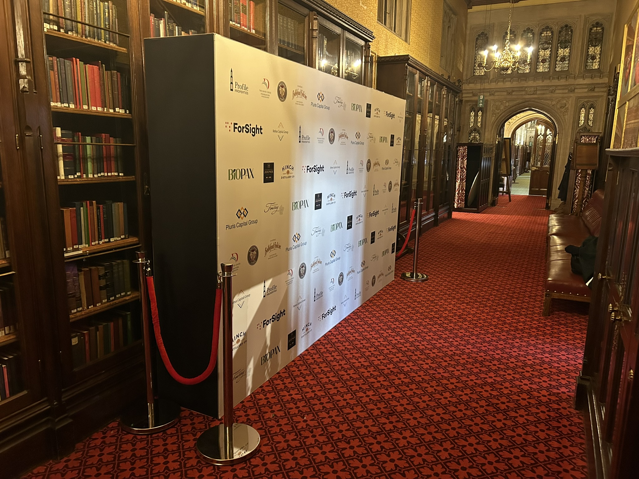 2.2 media wall in the corridor at an event at the house of lords london with rope barriers