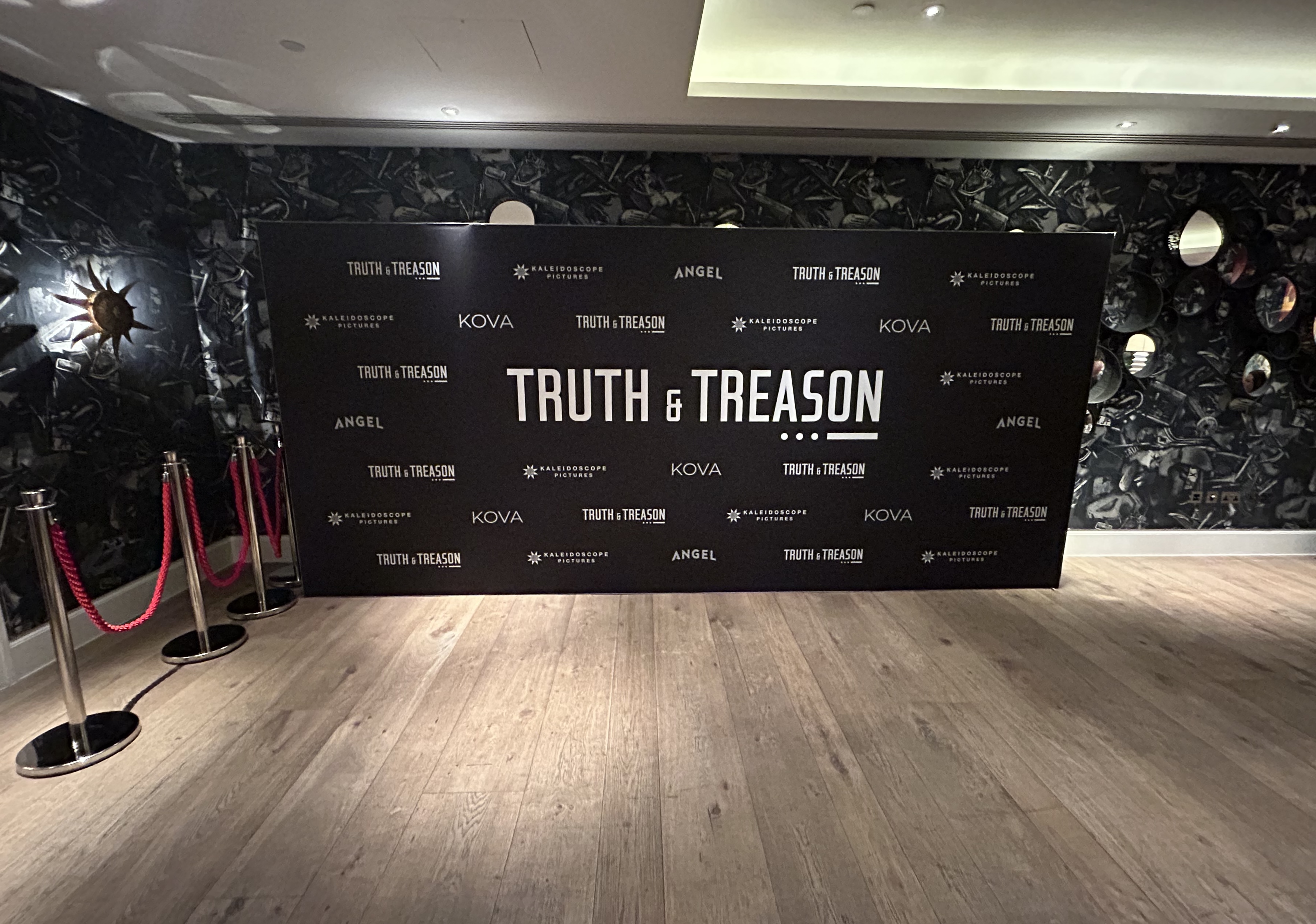 4.8m backdrop with a black background and company logos at the ham yard hotel
