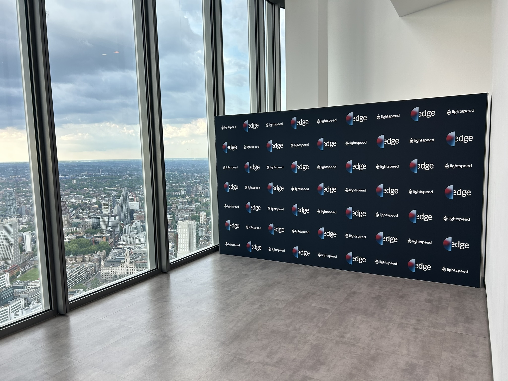 step and repeat wall at horizon 22 - with a view a the London skyline