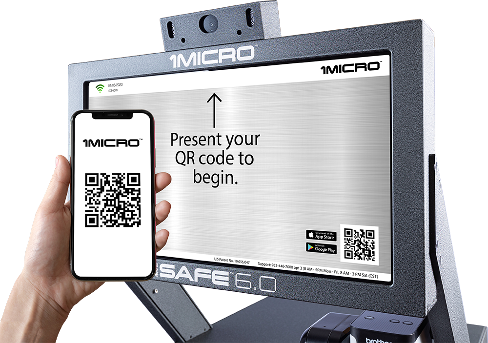 Hand holding a smartphone displaying a 1MICRO QR code next to a 1MICRO iSAFE 6.0 device screen instructing to present your QR code to begin.
