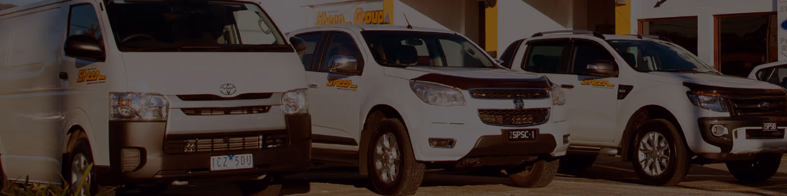 Banner image of a Sheen Group location featuring a wide, welcoming entrance with modern design elements.
