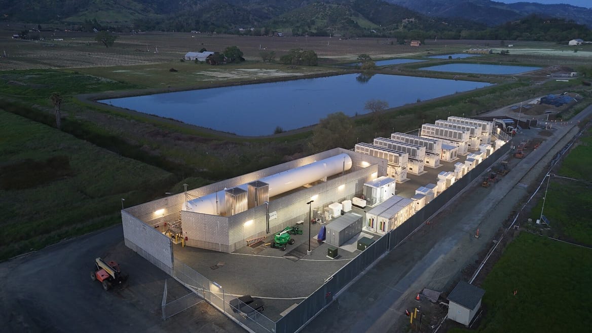 Aerial view of modest white industrial site