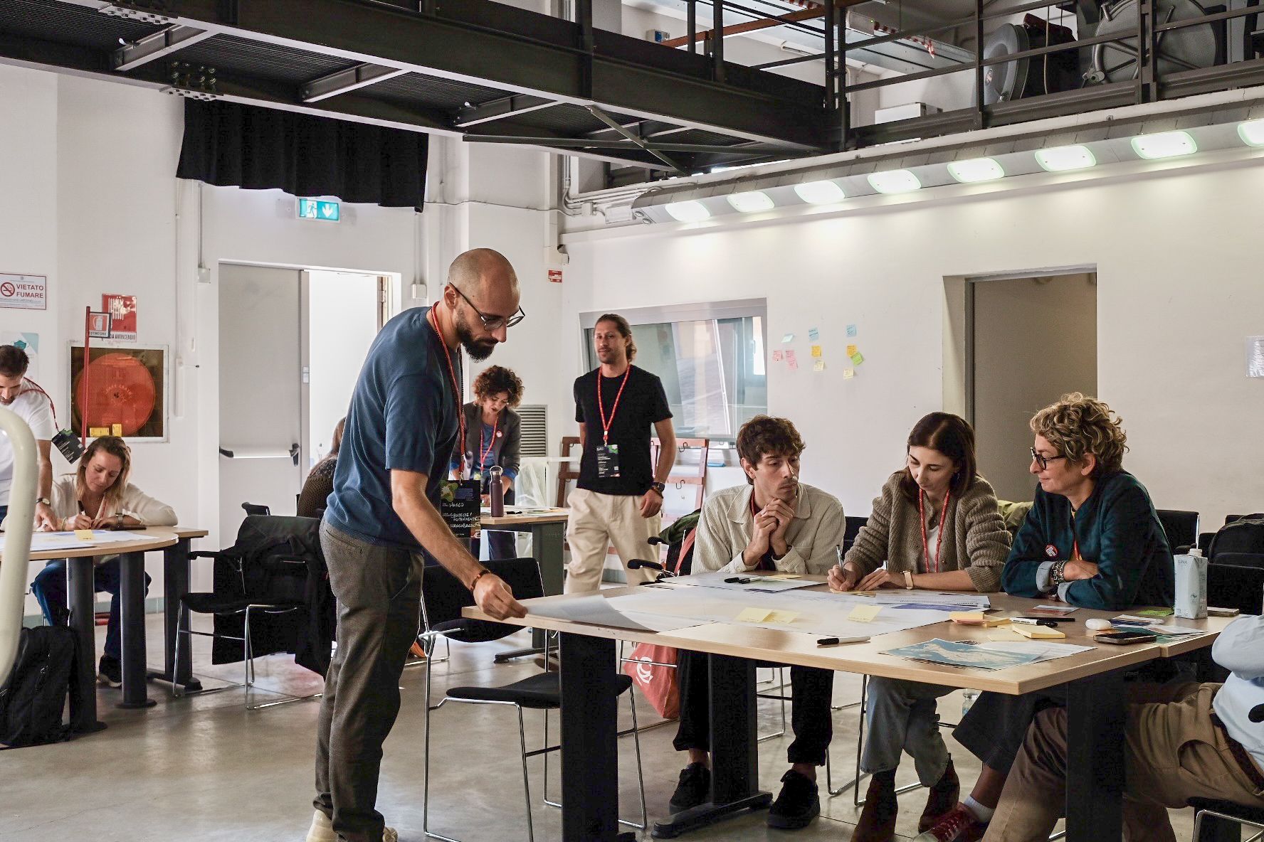 People in a workshop session with Marco