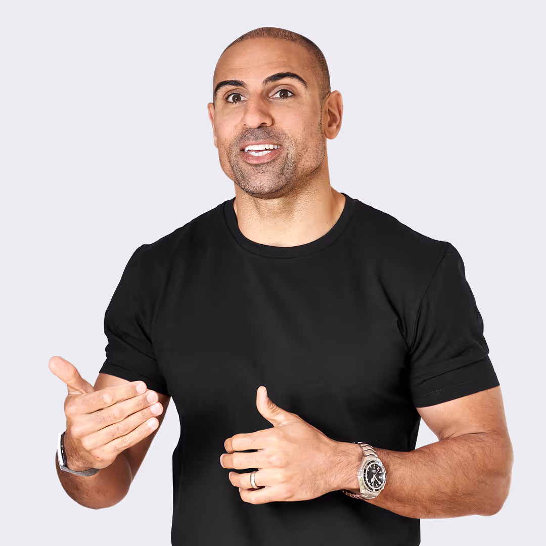 A man wearing a black shirt and a watch.