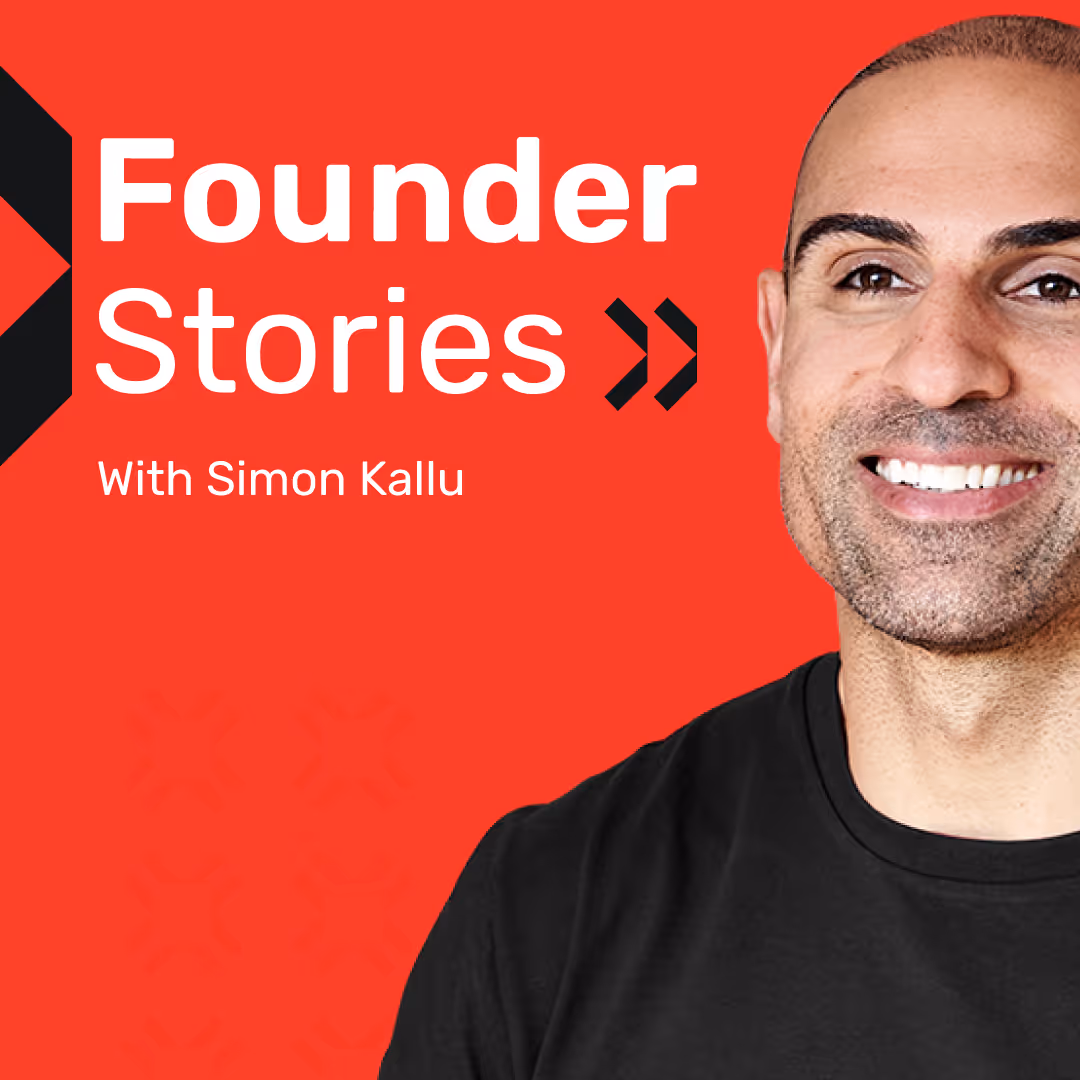 A man smiling with a black shirt that says Founder Stories.