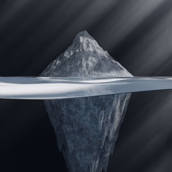 A large iceberg in the ocean.