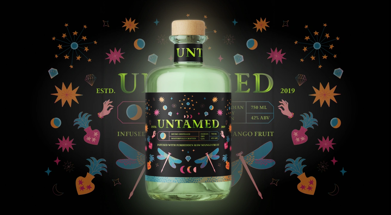 Premium alcohol packaging design for Untamed Gin by Dot and Grid – mystical, colourful bottle infused with forbidden raw mango fruit, featuring hand-illustrated celestial motifs, dragonflies, and vibrant tropical characters that elevate the brand’s luxury craft gin identity