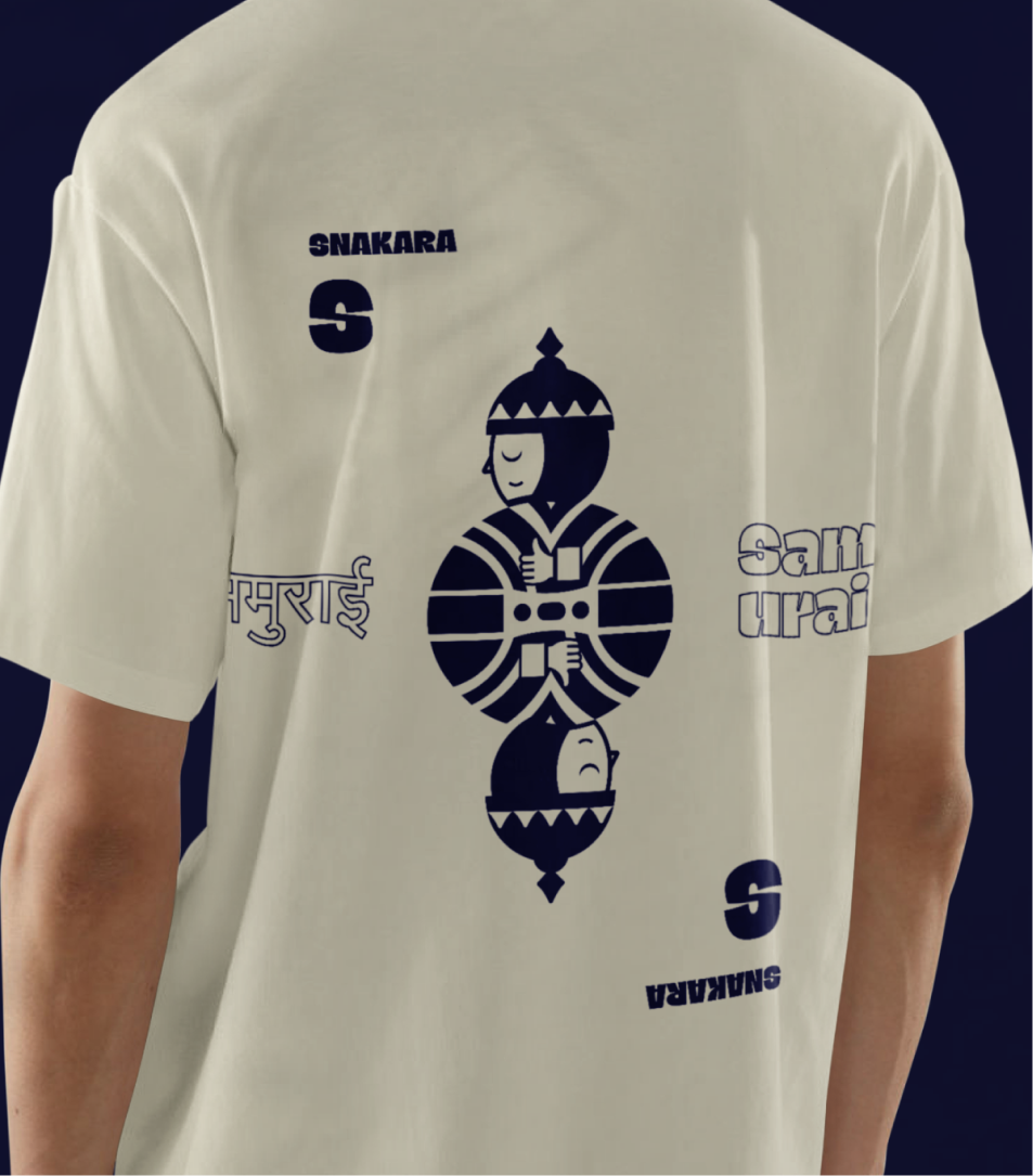 This image showcases **Snakara’s branded apparel**, blending streetwear with brand storytelling. The T-shirt design features the signature *Snakara Samurai* mascot in a mirrored illustration, flanked by multilingual typography — “Samurai” in English and Hindi — creating a cultural bridge between contemporary and traditional influences. The composition is playful and bold, with the “S” monogram and logo strategically placed to balance the visual rhythm. The navy-on-cream color palette keeps the design minimal yet impactful, staying true to Snakara’s core aesthetic of confident simplicity.

This kind of merchandise reinforces the brand’s visual identity beyond packaging — transforming Snakara into a lifestyle statement for the health-conscious yet style-forward audience.
