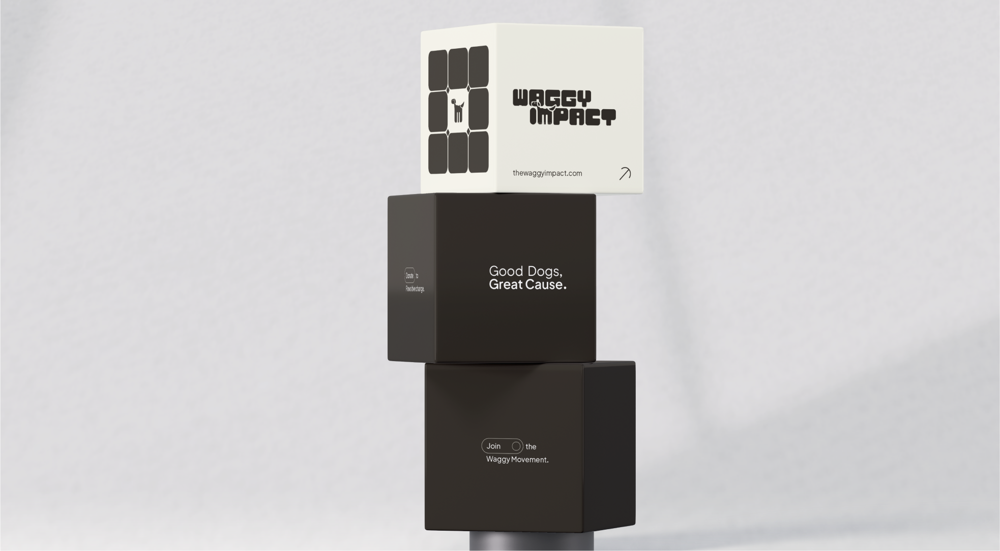 “Brand identity design for Waggy Impact by Dot and Grid – 3D cube installation showcasing logo mark, tagline ‘Good Dogs, Great Cause,’ and call-to-action ‘Join the Waggy Movement,’ highlighting modern visual branding for ethical pet care brand.