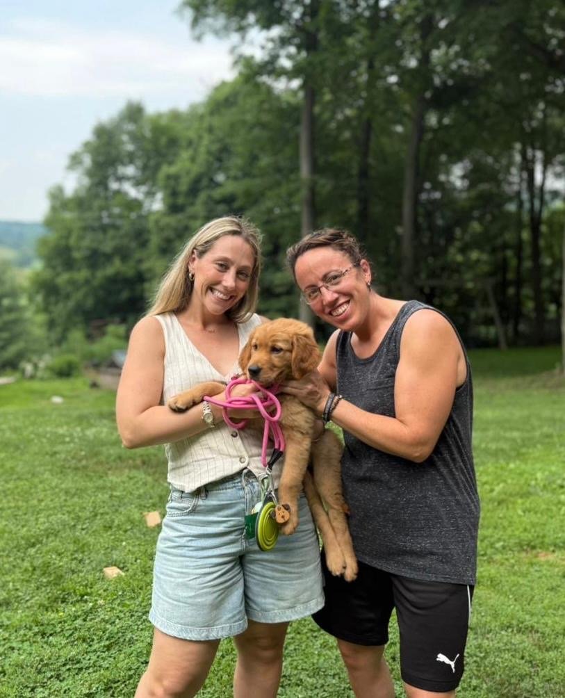 Lillian, our puppy trainer, with a Buckeye puppy