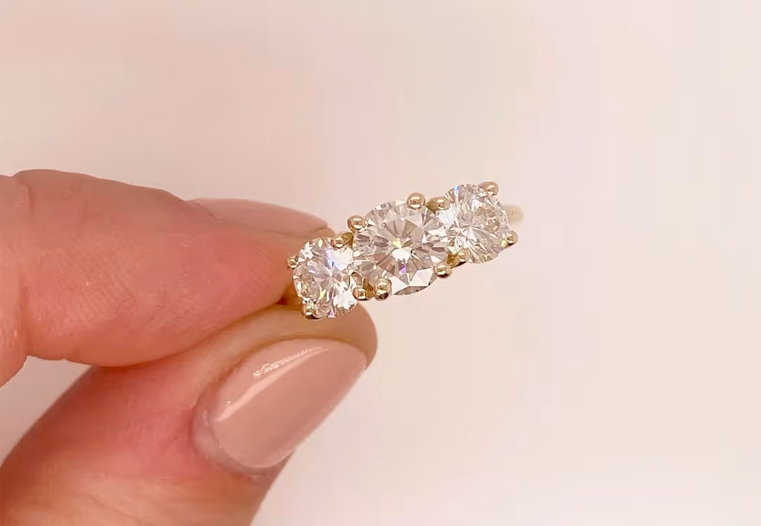 Round Cut Diamond Ring and Side Stones